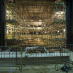 The discovery of significant archaeological remains beneath the theatre led to an extension of the building schedule.