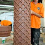 Hand finishing architectural terracotta ensures the character of the original piece is replicated as this Tudor chimney pot shows.